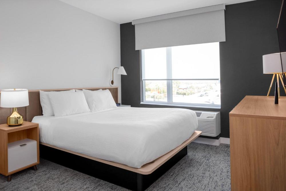 One-Bedroom King Suite with Sofa Bed and City View interior